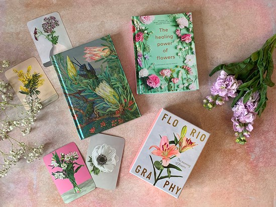 Floral themed books laid out in a dispaly