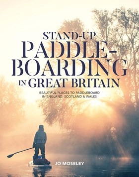 Stand up paddle boarding book cover featuring woman on paddleboard on a misty lake.