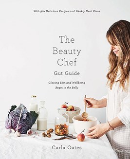 Book cover for the Beauty Chef featuring a woman preparing food against a white background.