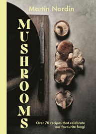 Book cover for mushroom recipe featuring photography of mushrooms.