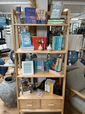 Books on a bookshelf in a retail setting