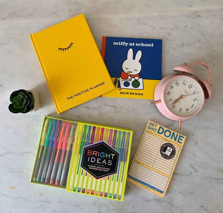 books scattered on a marble background