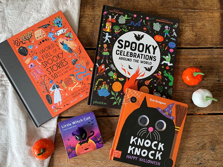 Halloween books spread out on a table