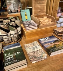 Piles of books in a retail display