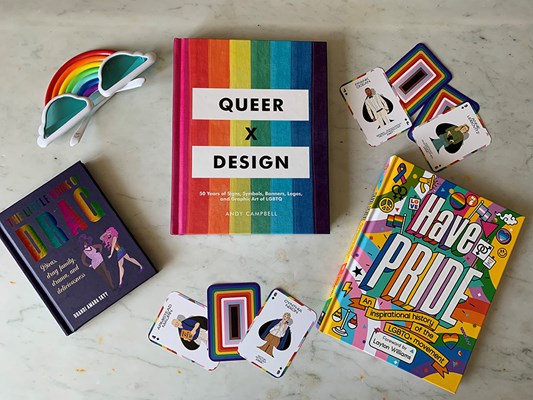 Selection of Pride themed books spread out.