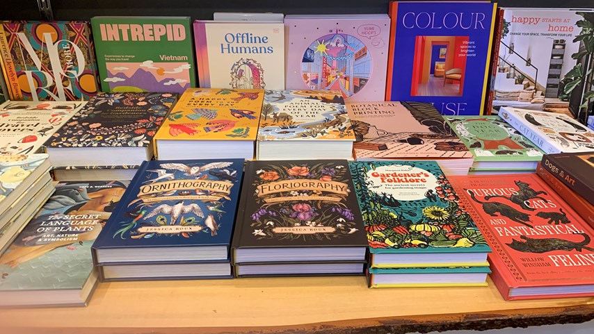 Colourful books displayed in a retail setting